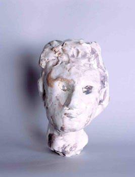 "Volto di giovanetto", 1983, ceramica, h. 23